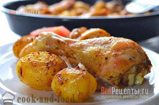 Piernas de pollo con patatas en el horno