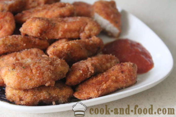 Pepitas de pollo empanado y frito de mama en una sartén - cómo hacer nuggets de pollo de la casa, fotos paso a paso de la receta